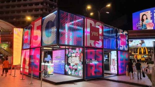 a building with colorful signs