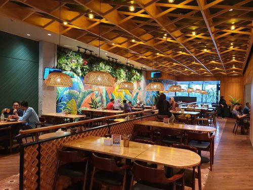 a room with tables and chairs