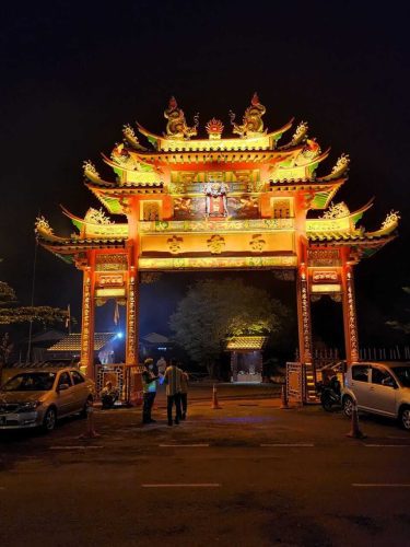 a large asian structure with lights
